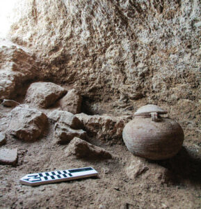 Cremation burial deposited in a cave at Legio