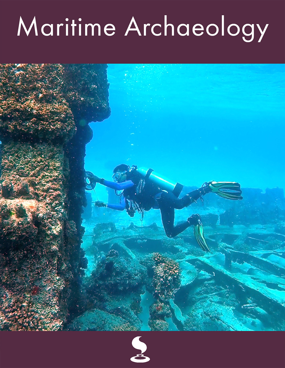 A scuba diver investigating underwater ruins